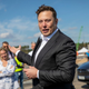 Tesla head Elon Musk talks to the press as he arrives to have a look at the construction site of the new Tesla Gigafactory near Berlin on September 03, 2020, near Gruenheide, Germany.